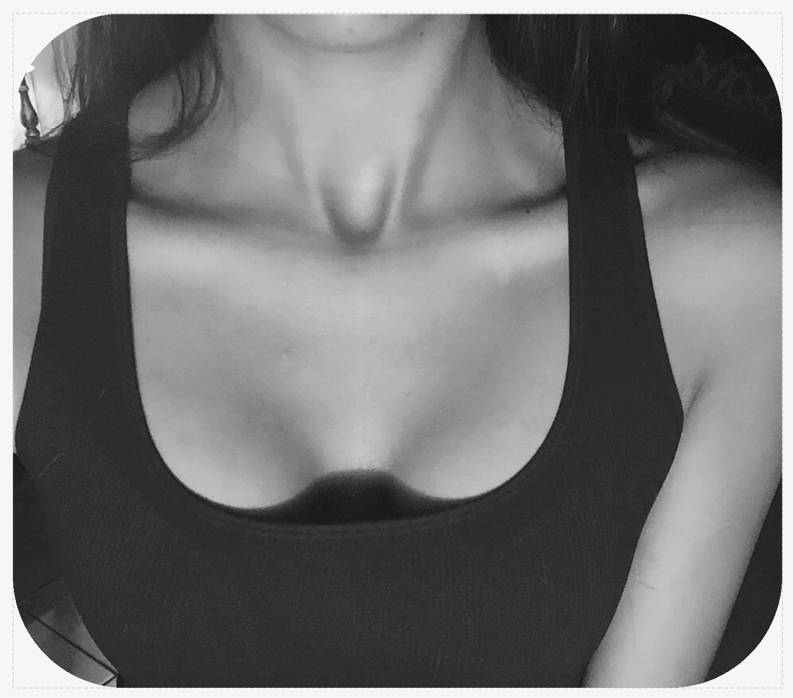 Front view of upper chest of woman with collarbones prominent