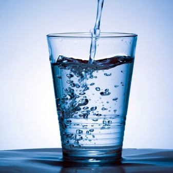 Water being poured into a glass