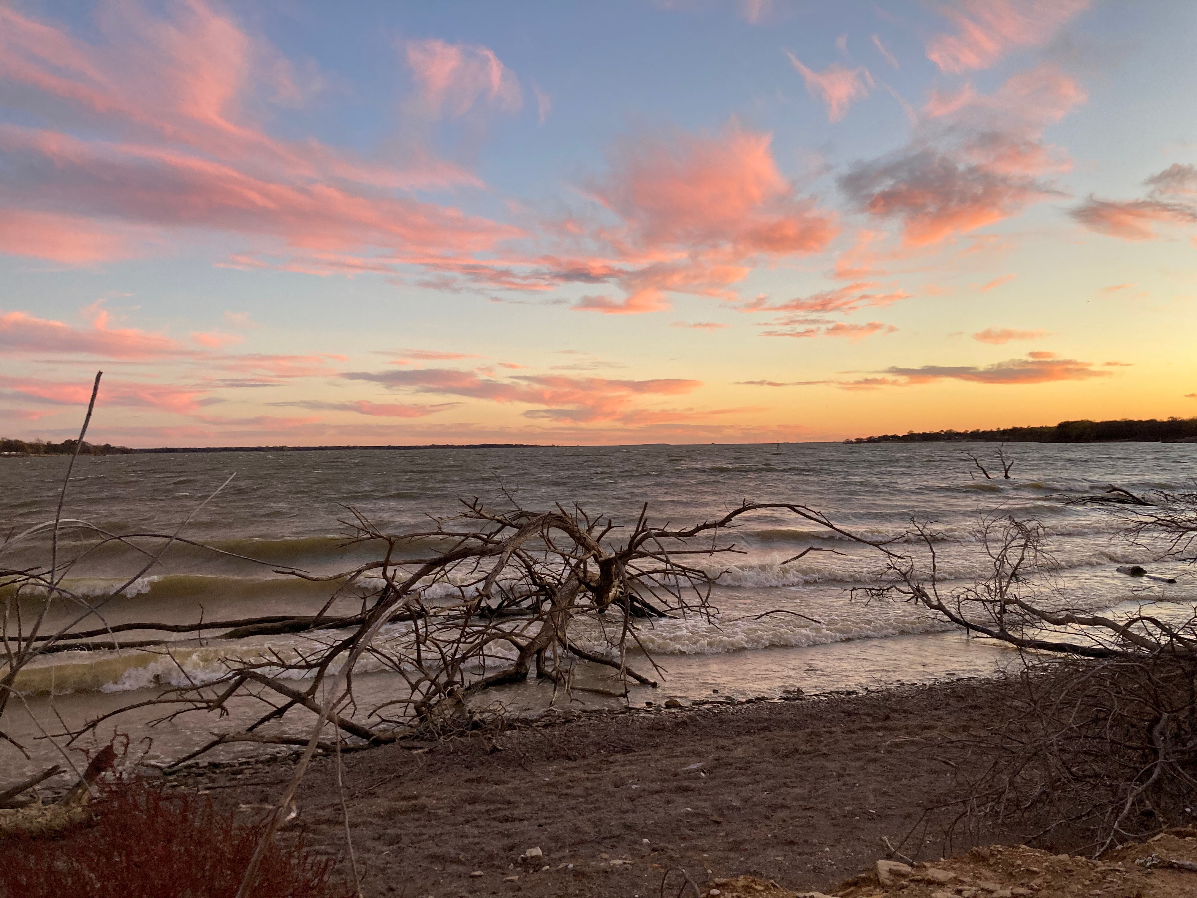 Lake Lewisville lakefront at sunset with wind