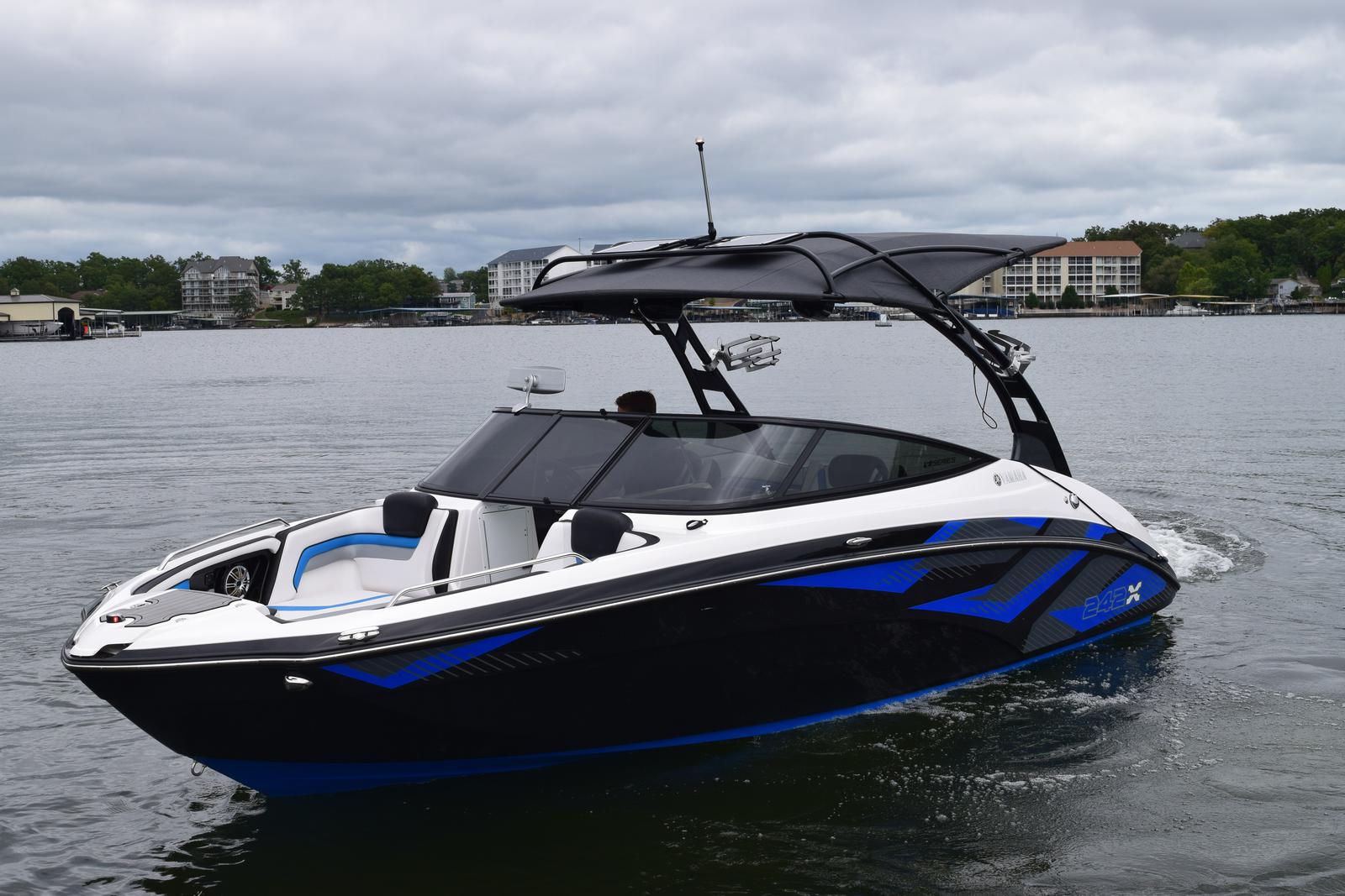 Blue Yamaha jet boat with roof