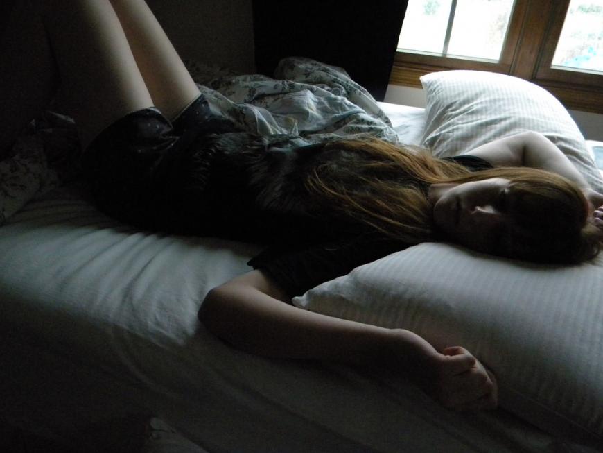 Girl fallen asleep with her legs in V-position